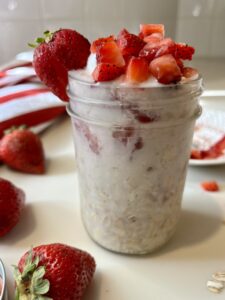 overnight oats with strawberries in a mason jar